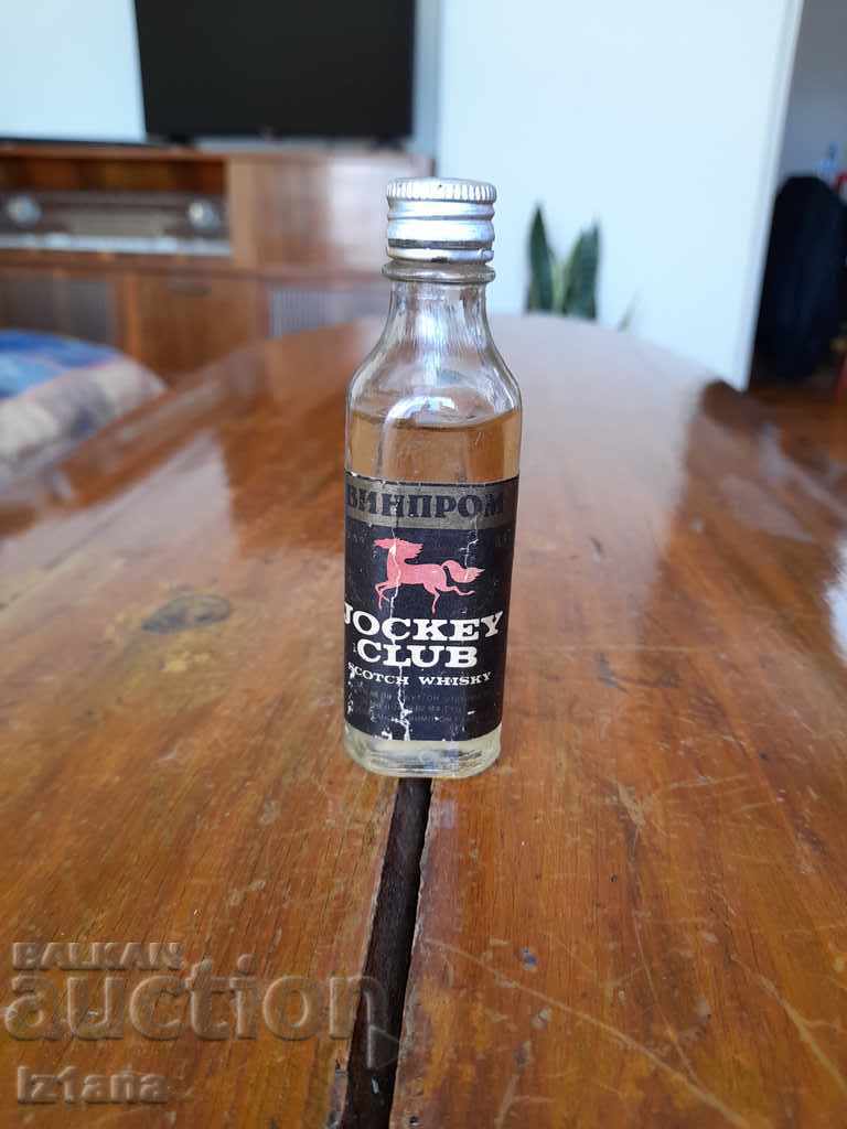 Sticlă veche de Whisky Jockey Club