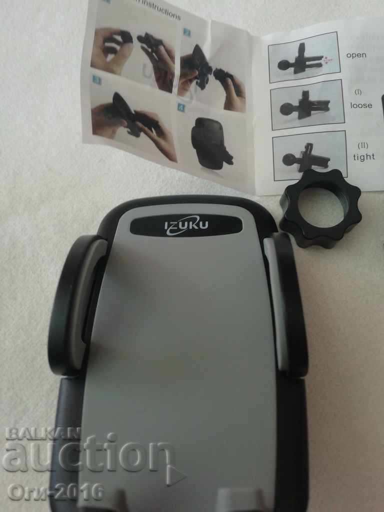 Livrarea Suport telefon cu clemă pentru montare într-o mașină ventilată Livrarea Suport telefon cu clemă pentru montare într-o mașină ventilată