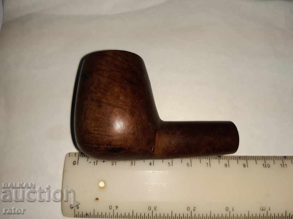 Mare pipă veche, cap