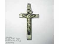 Old religious cross with crucifix pendant medallion