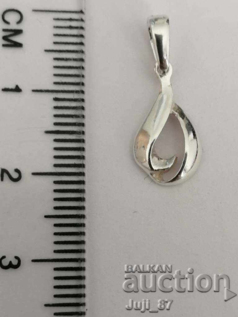 New silver pendant