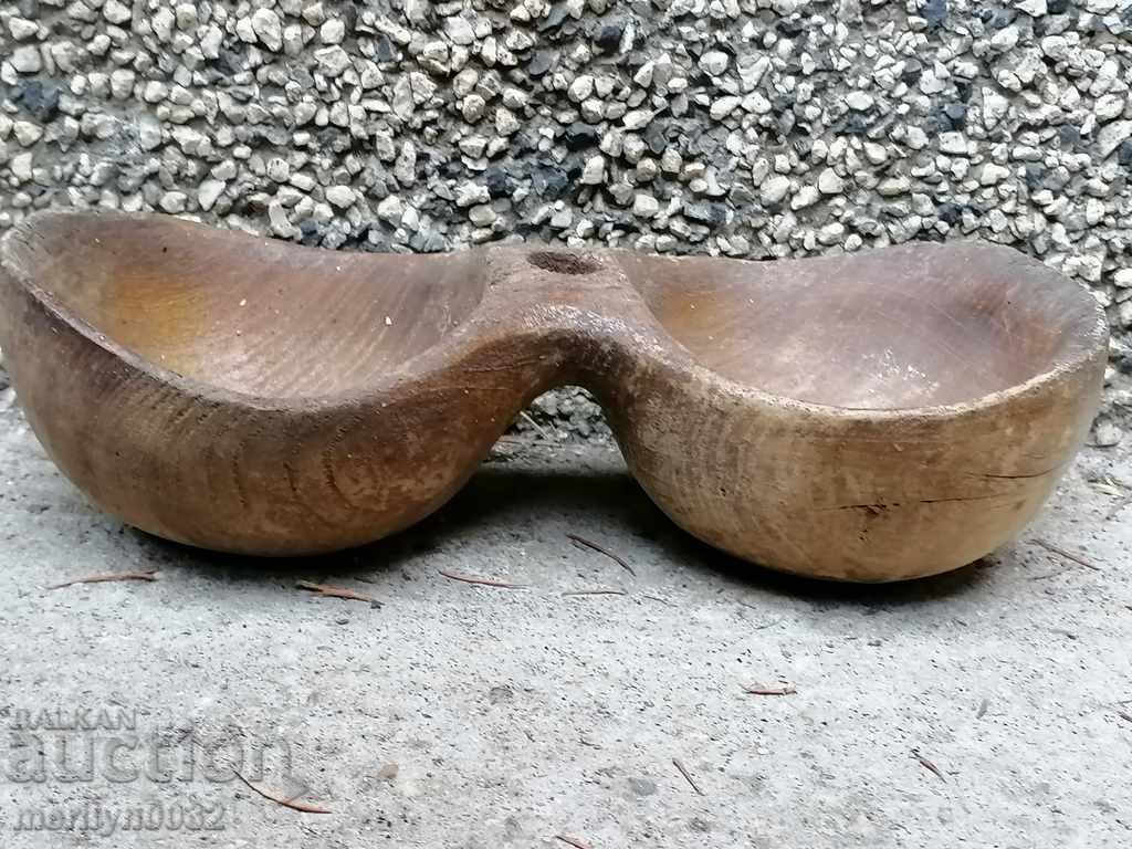 Delivery of An old wooden salon, a salt pan with a spoon, the wooden one Delivery of An old wooden salon, a salt pan with a spoon, the wooden one