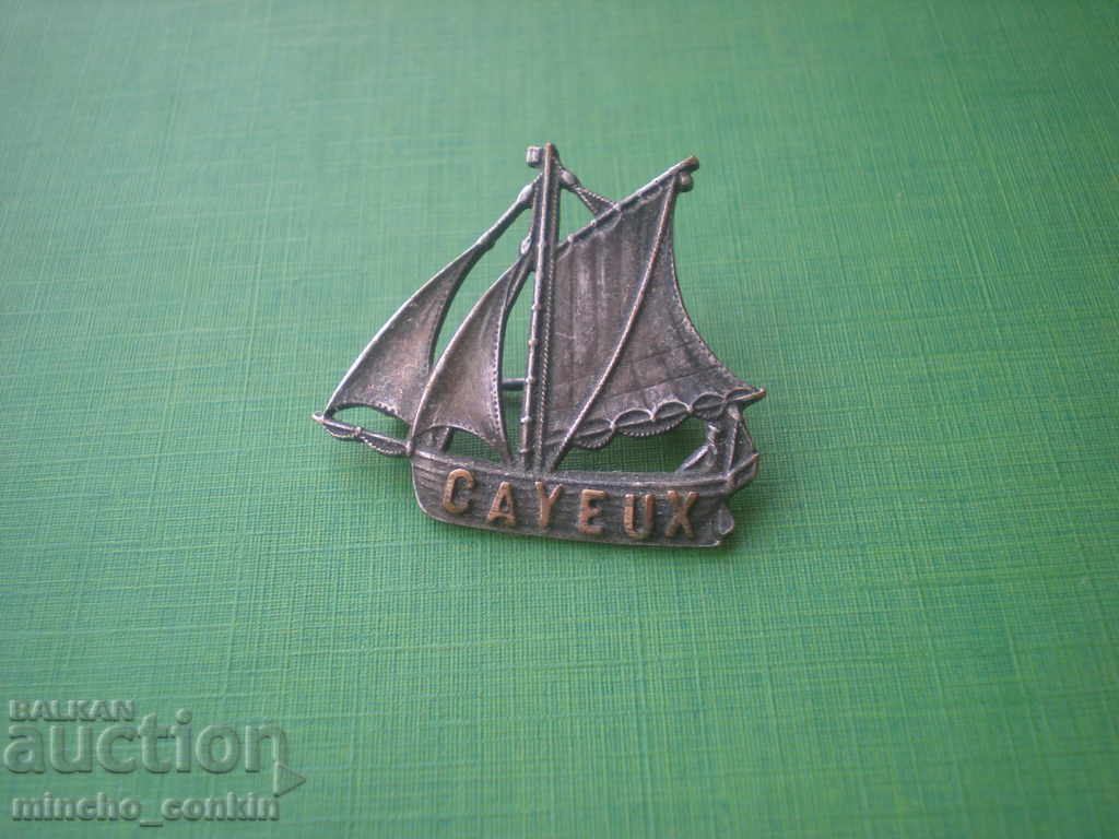 Silver-plated sailboat brooch beauty and style.