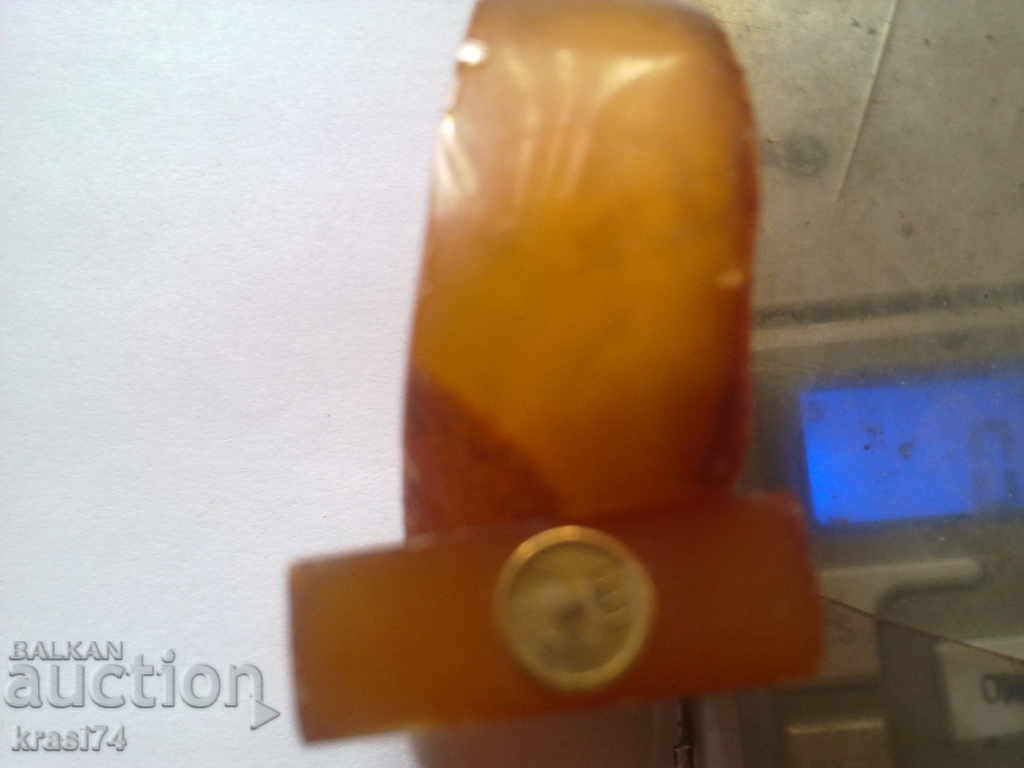 A large piece of amber with price 120.00 BGN | € 61.36 A large piece of amber with price 120.00 BGN | € 61.36