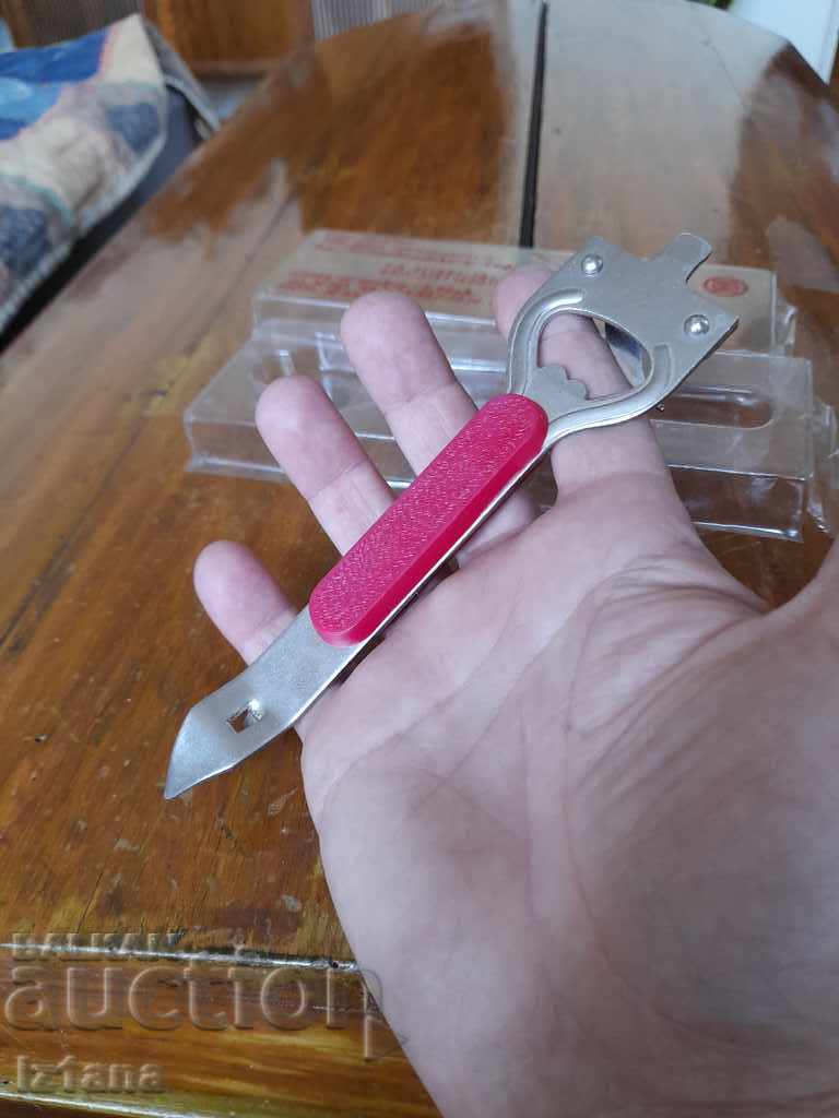 An old universal opener - 6