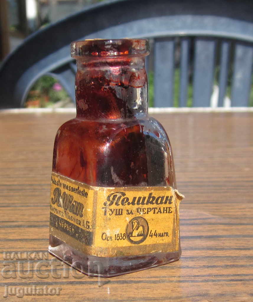 antique glass bottle red ink bottle PELIKAN PELIKAN with price 30.00 BGN | € 15.34