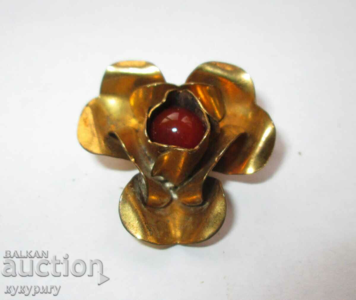 Old lady's gold plated flower brooch
