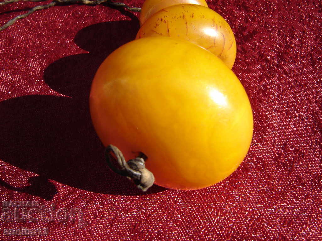 Delivery of Old Amber Bakelite Necklace