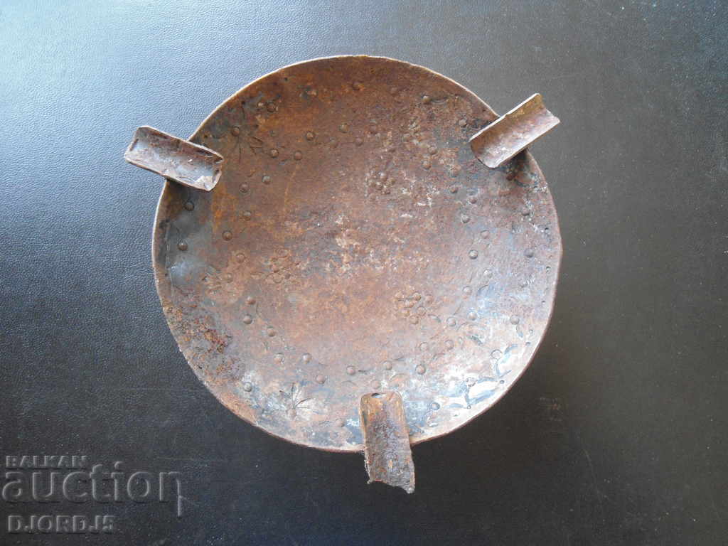 Old forged metal ashtray
