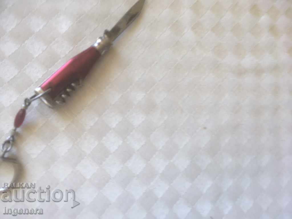 Delivery of KNIFE FOLDING WORKING MINI KEYCHAIN STAR