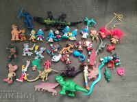 гумени играчки: Алф , смърфове,   динозаври...