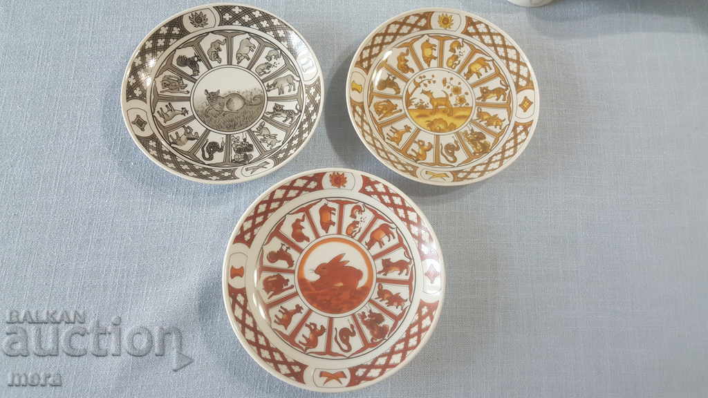 Porcelain plates with motifs from the Chinese horoscope