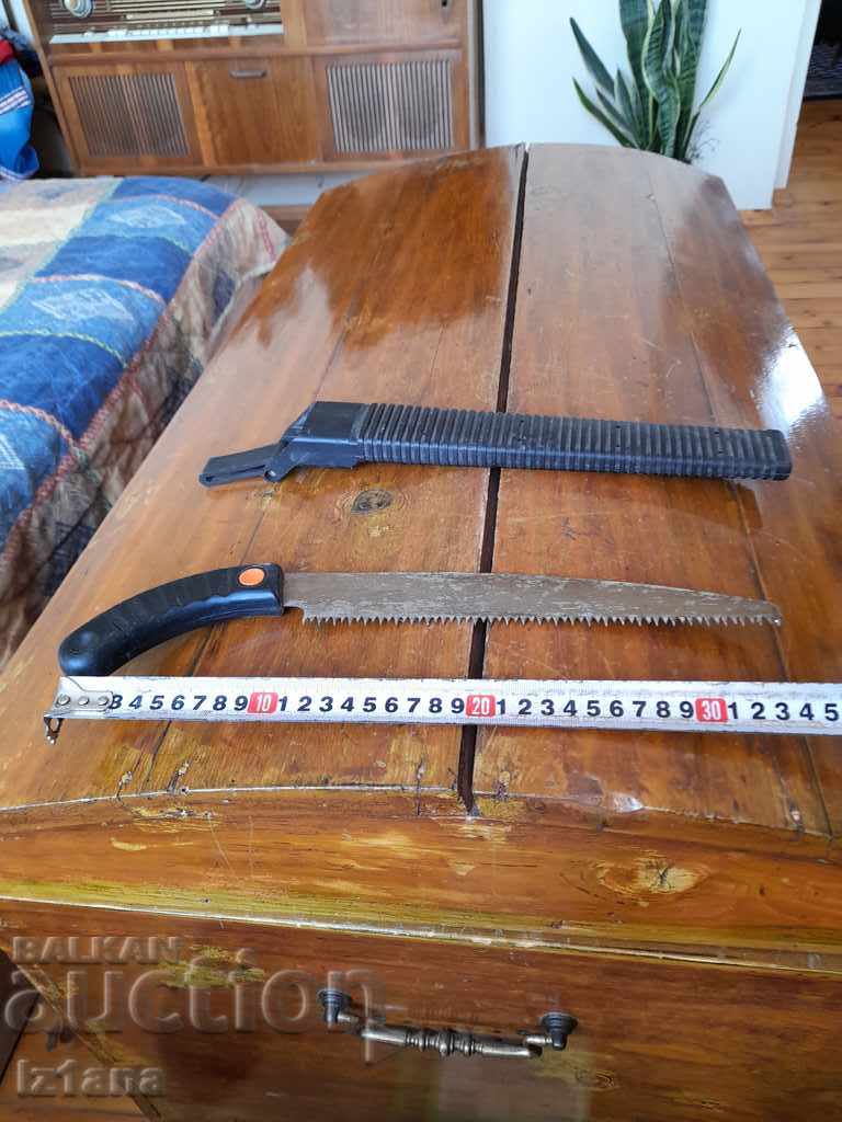 Auction  An old saw, a saw