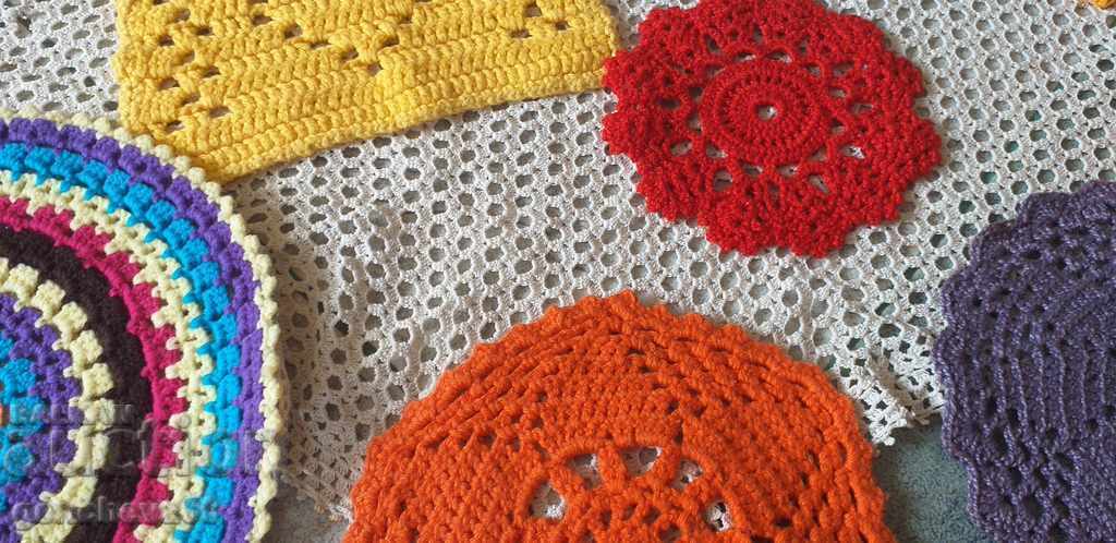 Delivery of Various multi-colored hand-knitted plaids for decoration