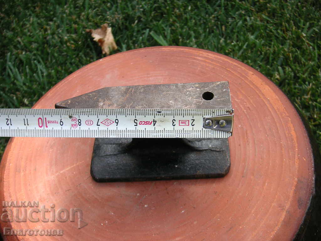 Auction  Watchmaker's gold anvil