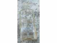 OLD GLASS PHARMACY BOTTLE LION PETAL BOTTLE