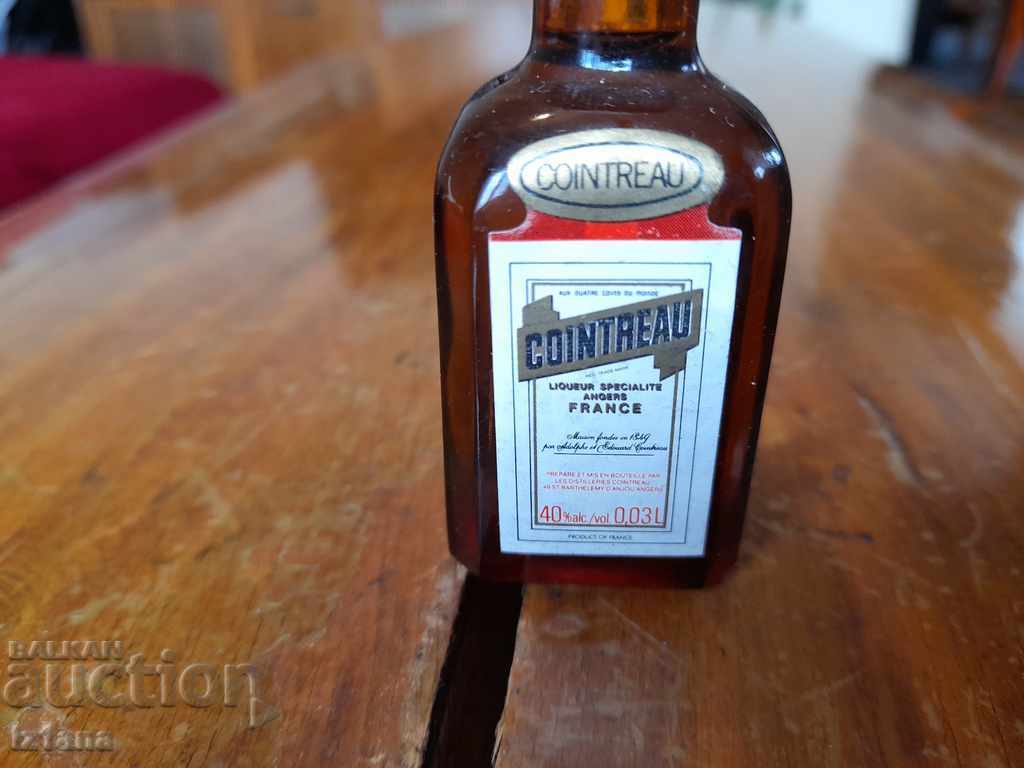 Old bottle of Coinreau with price 20.00 BGN | € 10.23 Old bottle of Coinreau with price 20.00 BGN | € 10.23