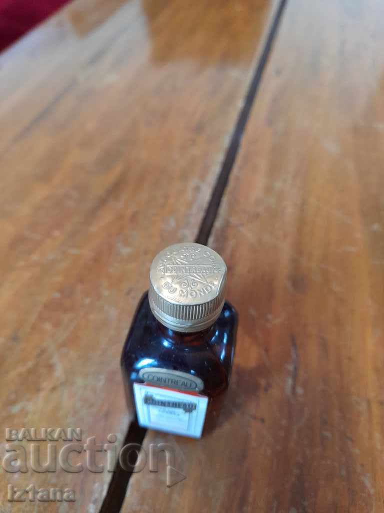 Auction Old bottle of Coinreau Auction Old bottle of Coinreau