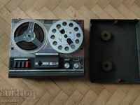 Old radio tape recorder with rollers