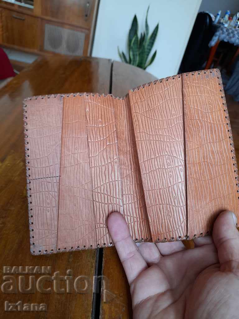 Delivery of Old leather wallet, purse
