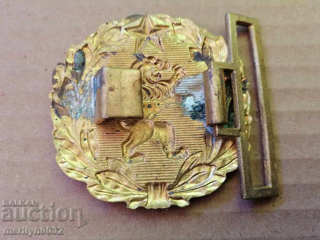 Delivery of Officer's bronze belt buckle, buckle blazon