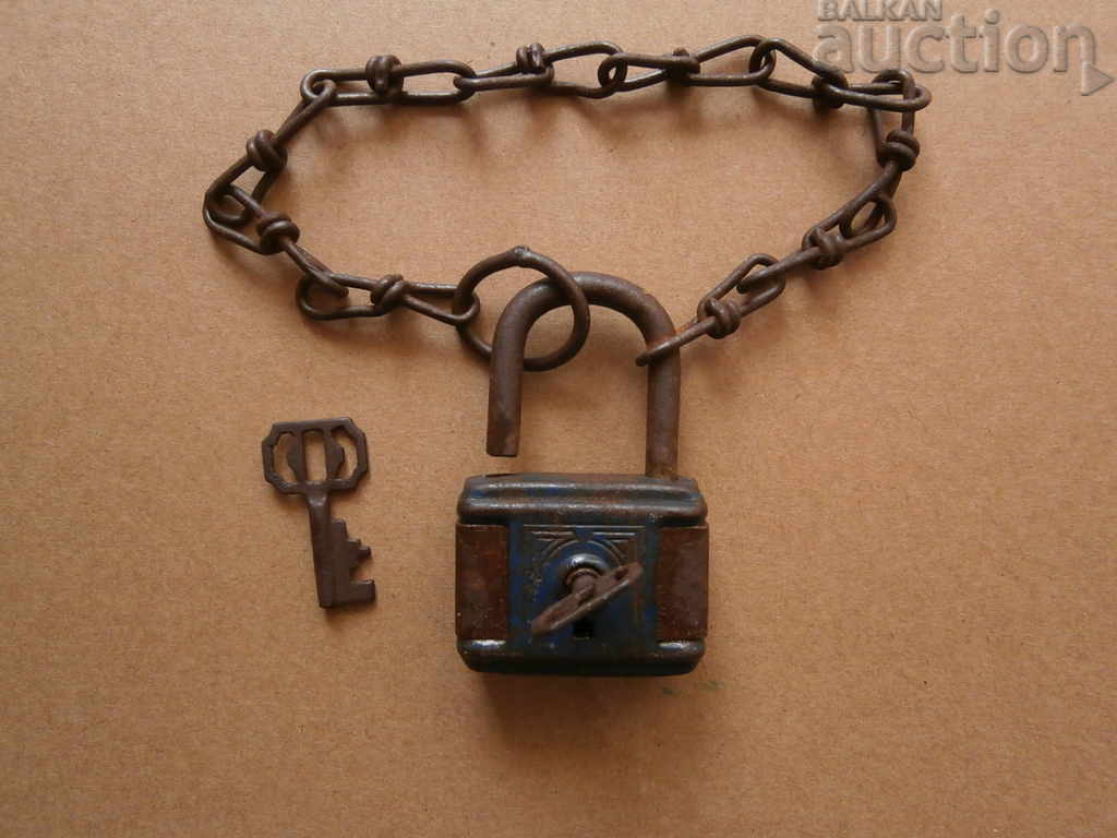 Auction retro vintage padlock with key Auction retro vintage padlock with key