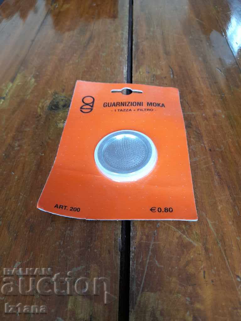 Old strainer, gasket for coffee maker, coffee machine Old strainer, gasket for coffee maker, coffee machine