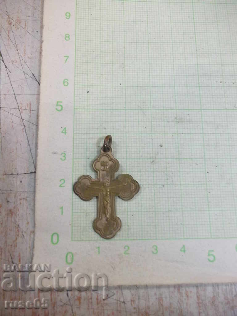 Small bronze cross with the crucifix