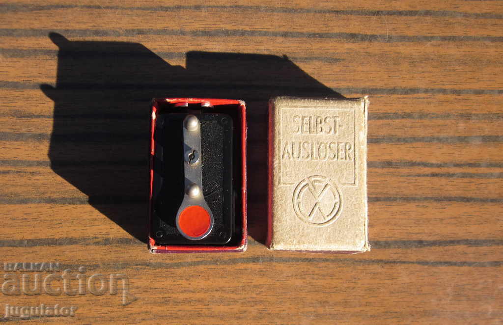 old German photographic mechanical self-timer in a box