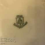 Auction  Set of eight porcelain plates marked for 90 years