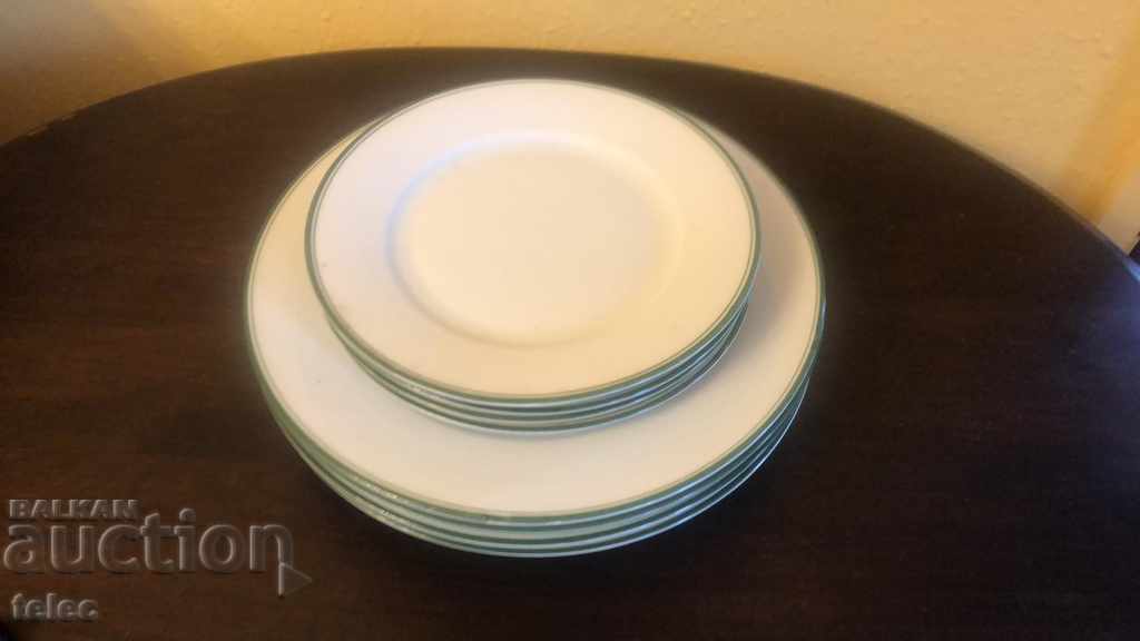 Set of eight porcelain plates marked for 90 years