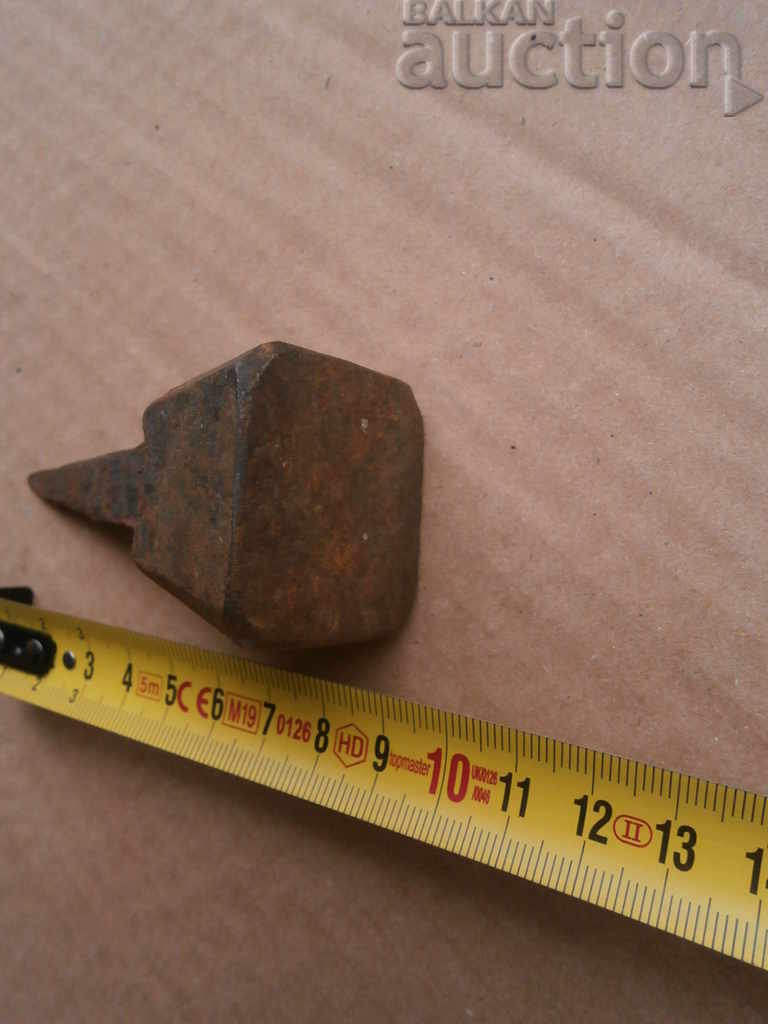 an ancient primitive anvil - 5