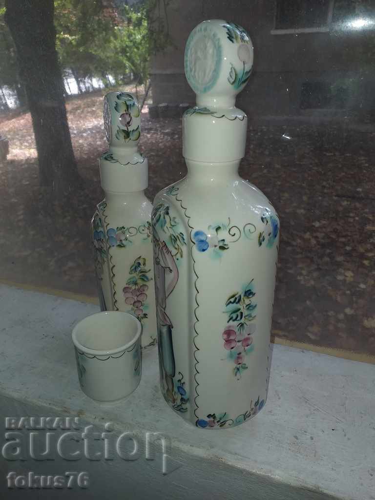 Auction Russian porcelain two bottles and a cup with Cossack motifs Auction Russian porcelain two bottles and a cup with Cossack motifs