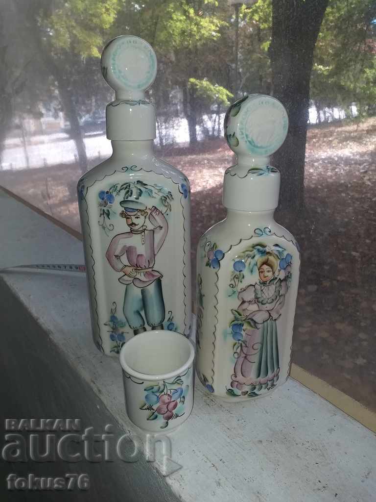 Russian porcelain two bottles and a cup with Cossack motifs
