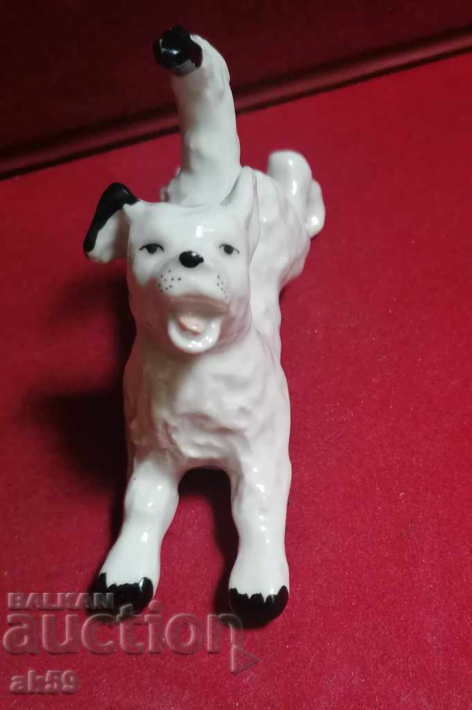 Old porcelain figurine - a puppy.