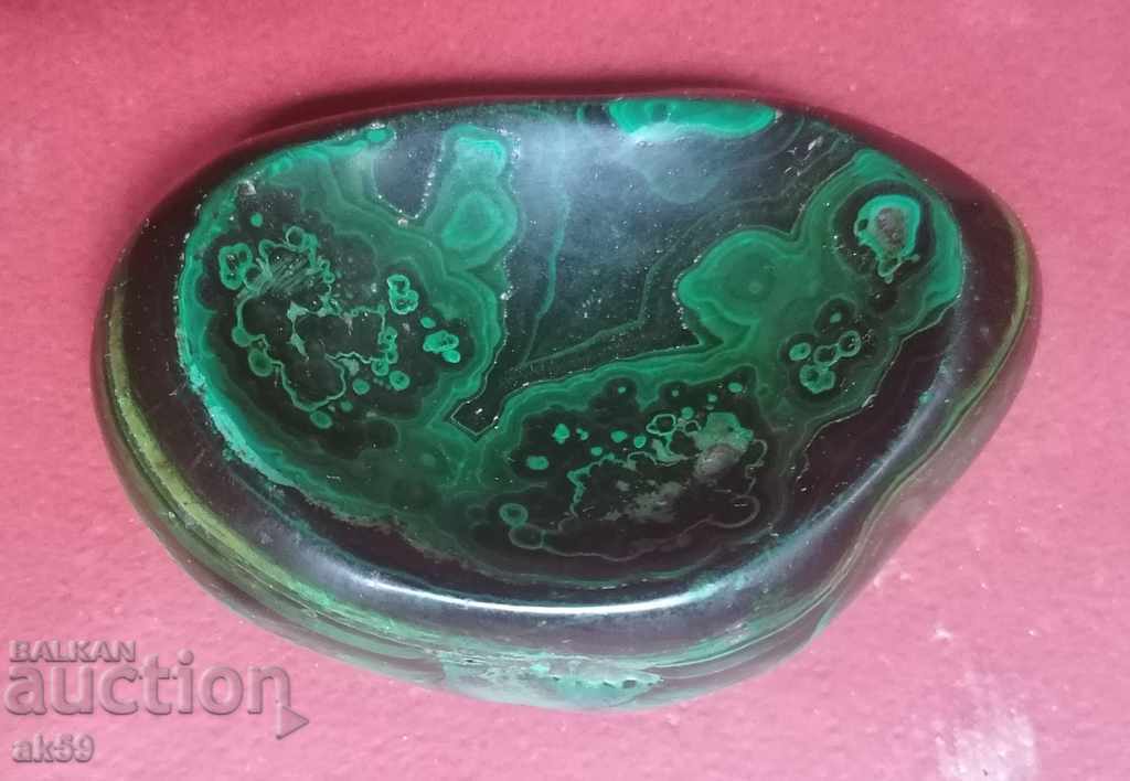 Polished malachite.