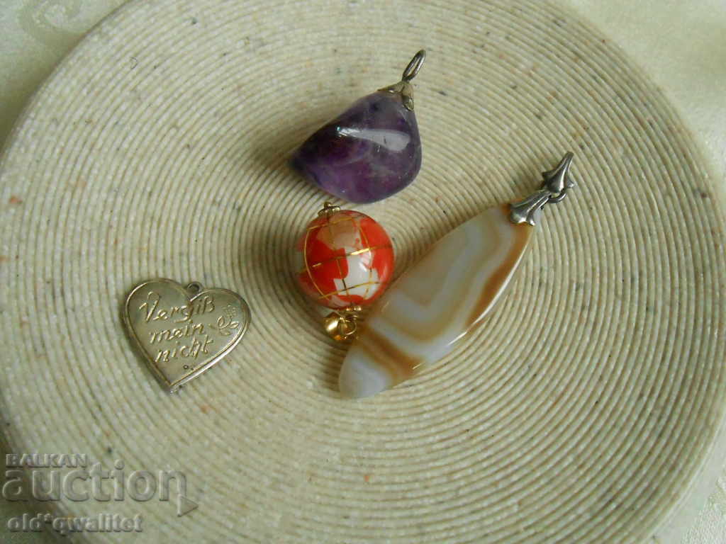 Delivery of Interesting pendants, medallions, silver and natural stones Delivery of Interesting pendants, medallions, silver and natural stones