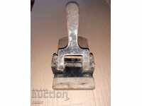 Very old, very large office paper punch