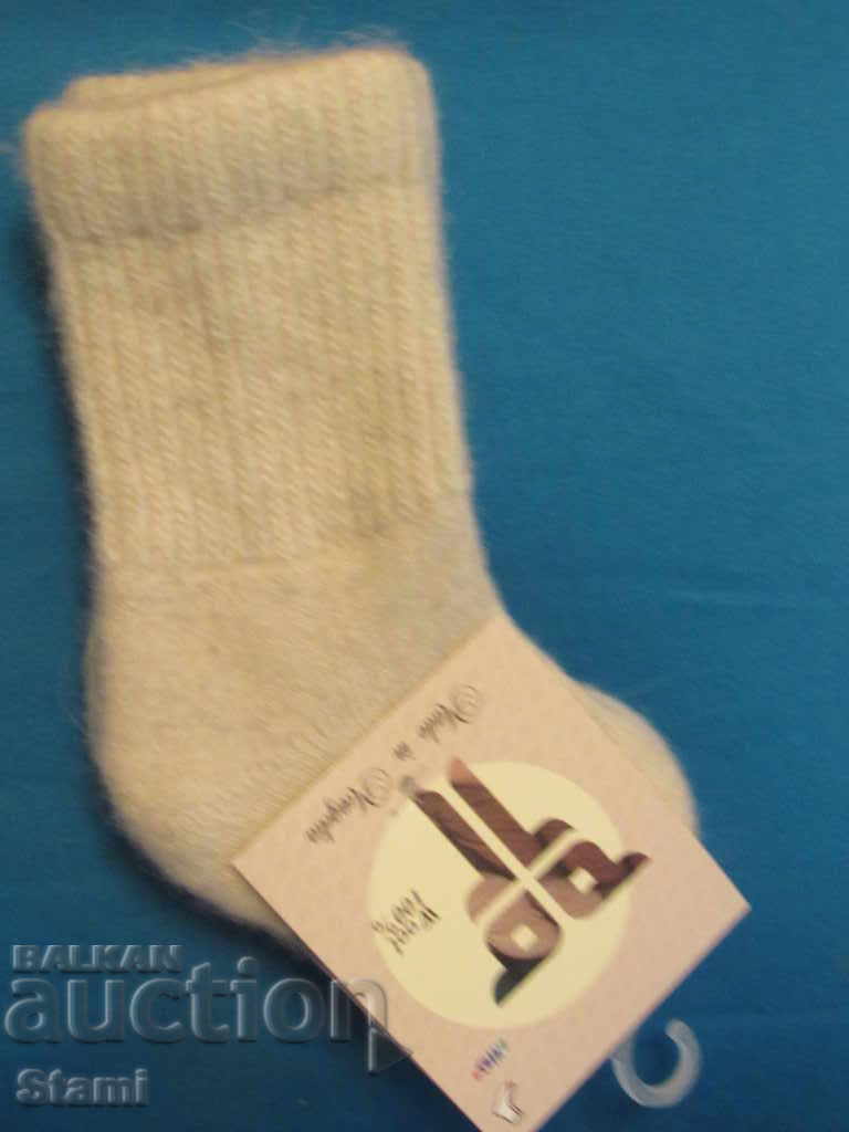 Machine knitted baby socks in 100% wool, size 0