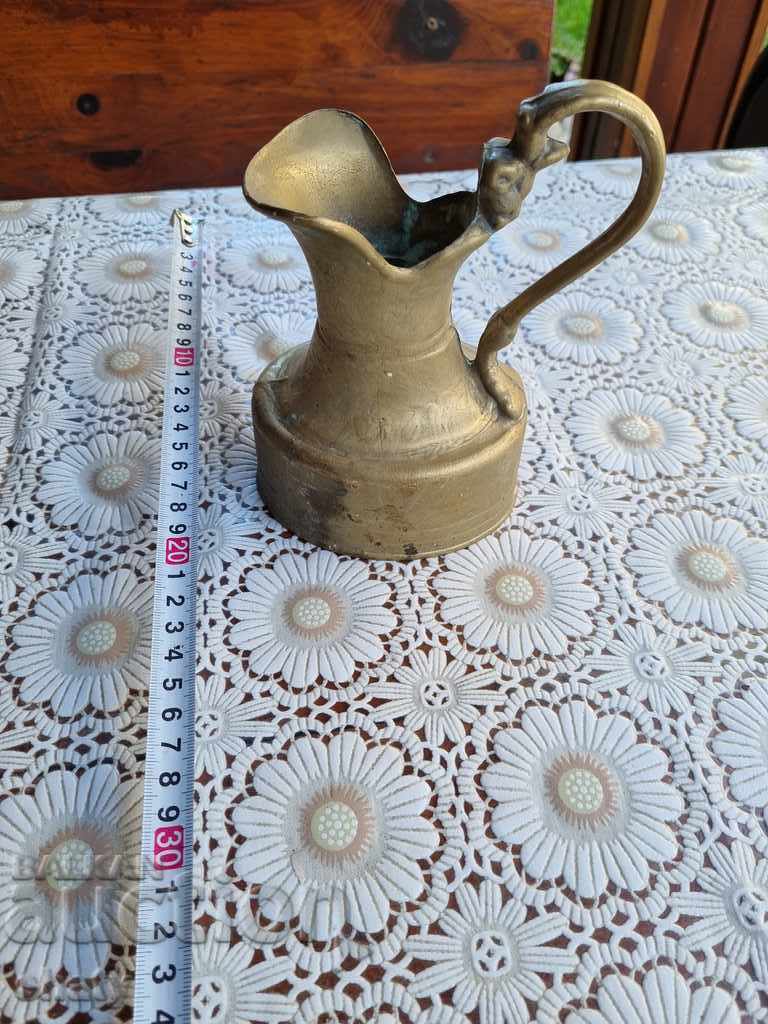 Old bronze jug