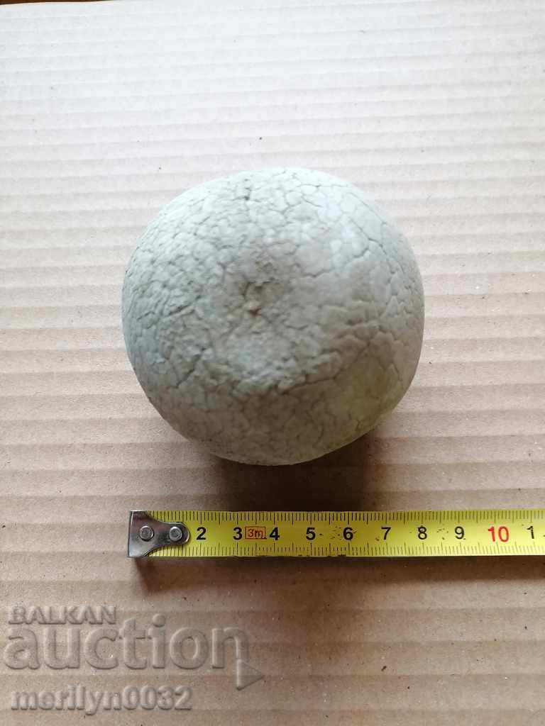 Delivery of An old tennis ball on the court in the 30s Delivery of An old tennis ball on the court in the 30s