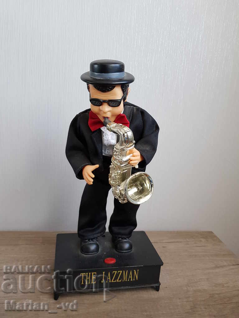 Licitație Jucărie veche alimentată cu baterii, jazzman