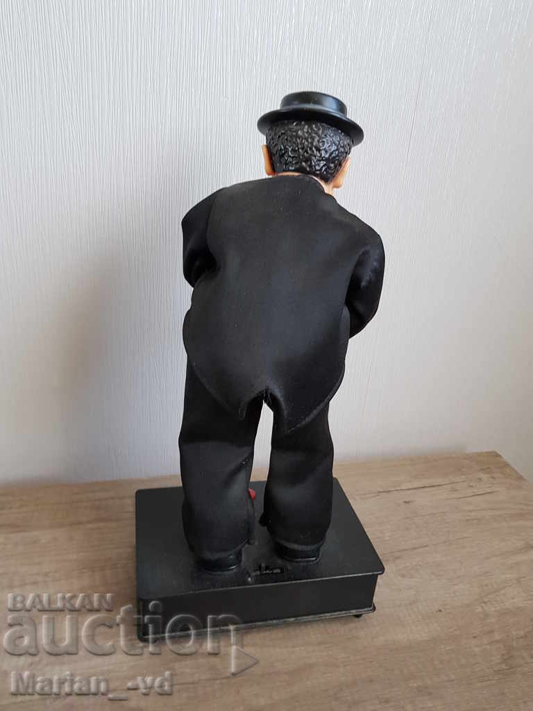 Livrarea Jucărie veche alimentată cu baterii, jazzman