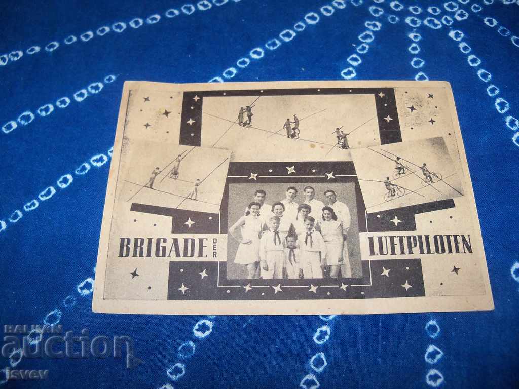 Old card of circus artists - aerial acrobats from the GDR