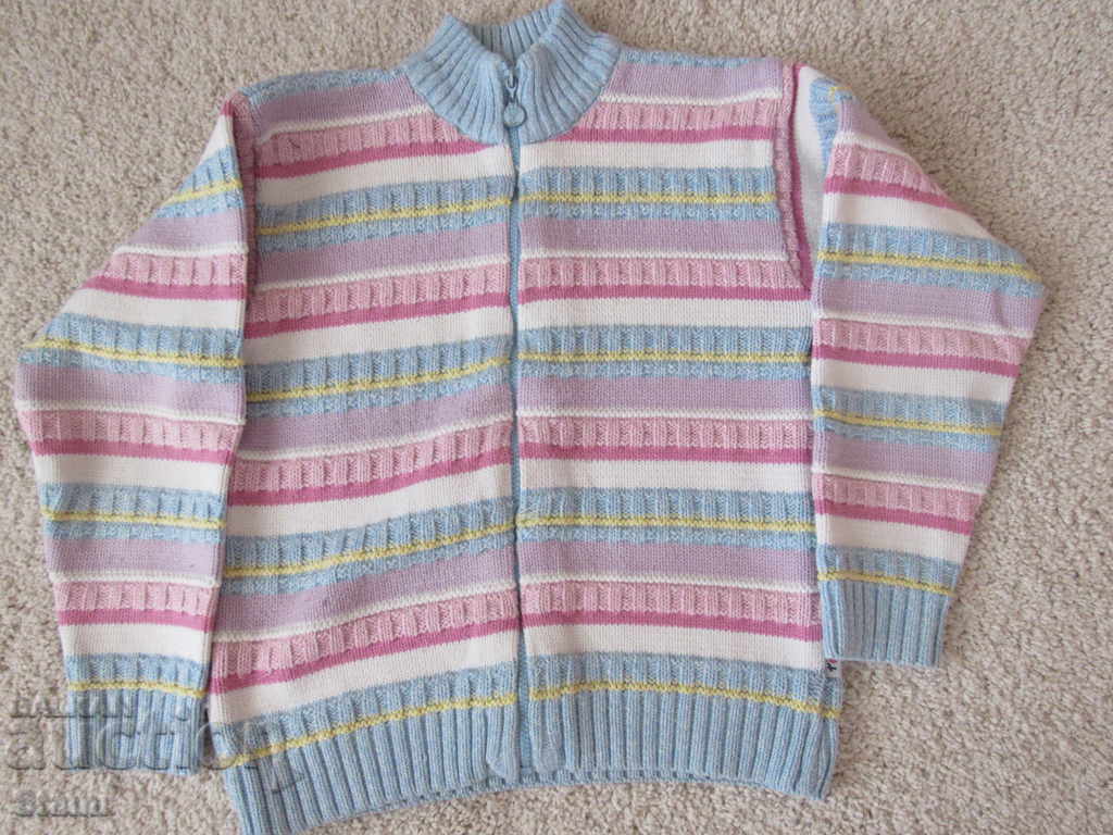 Machine knitted cardigan for a girl with a zipper, size 164