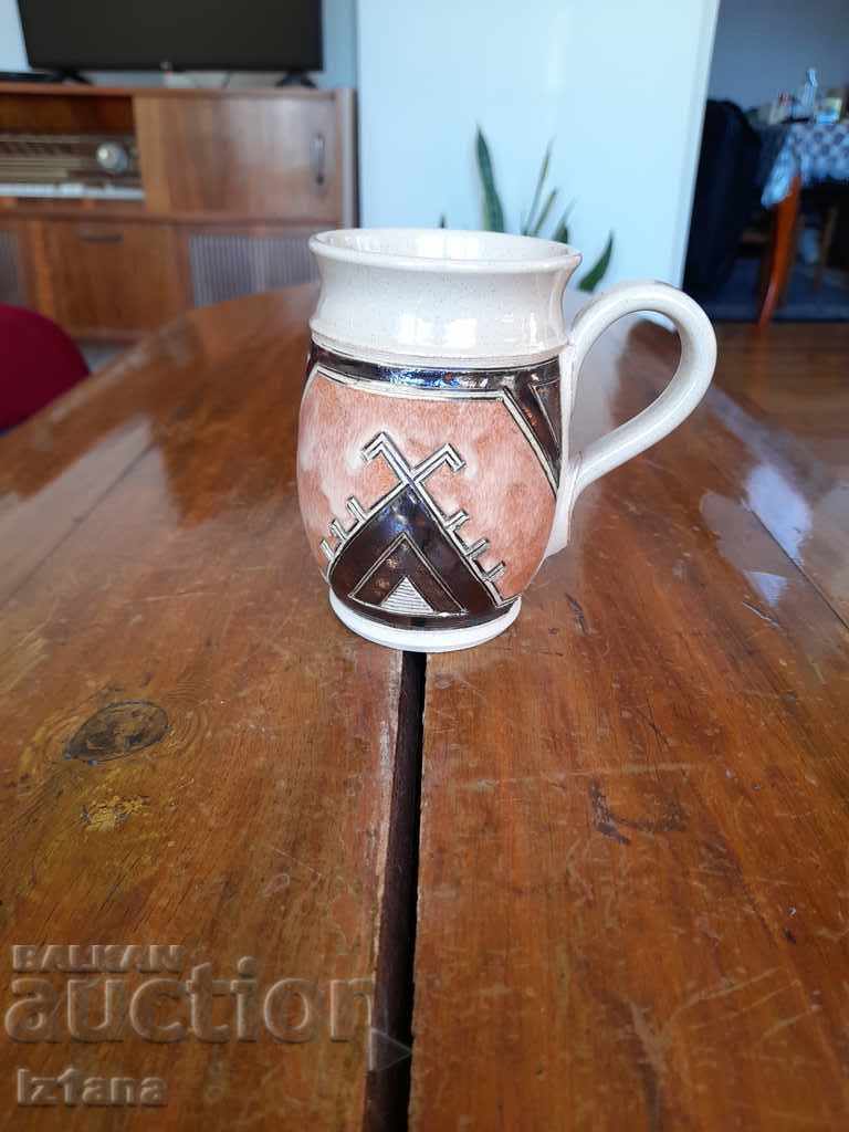 Old porcelain cup, jug