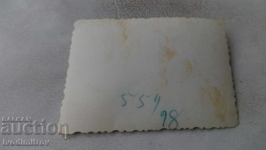 Photo A woman and two men sitting on the curb with price 1.85 BGN | € 0.95