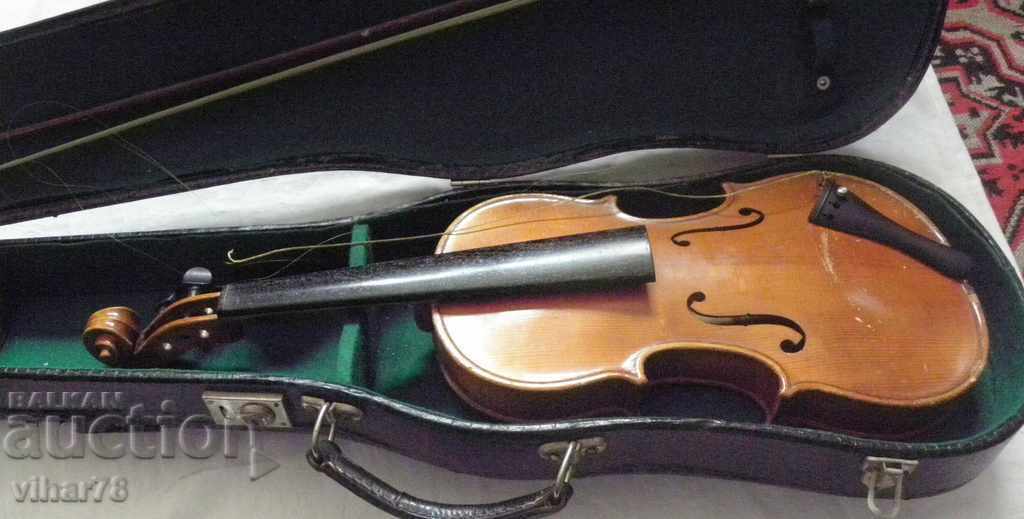 violin with suitcase