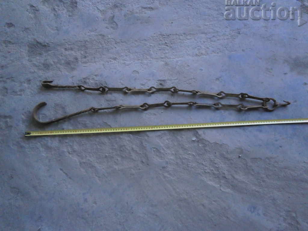 Auction  Old wrought iron chain with hook, twisted iron hook