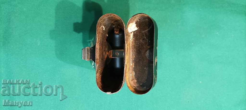 Delivery of I am selling an old German WWII military flashlight.